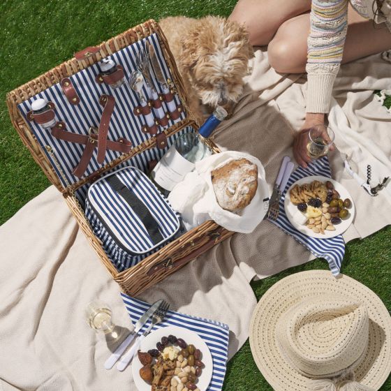 Woven Picnic Basket complete with two place settings wine glasses napkins corkscrew and mini cooler Blue and White strip interior