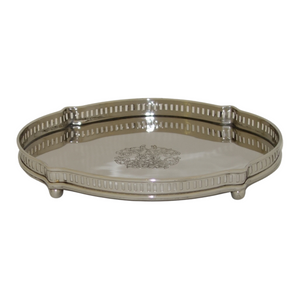 The distinctively detailed design of this Chippendale-style tray brings a tastefully elegant presentation when serving canapes or drinks to your guests, or holding glassware on your bar. Also lends a sophisticated look to your bedroom when used as a vanity tray on your dresser. Measures 11.75 inches wide x 9.25 inches long x 1.5 inches high. Made from stainless steel.