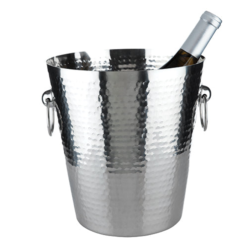 In the Forge Hammered Metal Ice Bucket, classically sculpted stainless steel is broken up by powerful blows for a hammered finish, resulting in sleek lines rent just enough to capture the light necessary for showcasing your wine. Stainless Steel Construction. Hammered Finish. Fits Standard Bottles